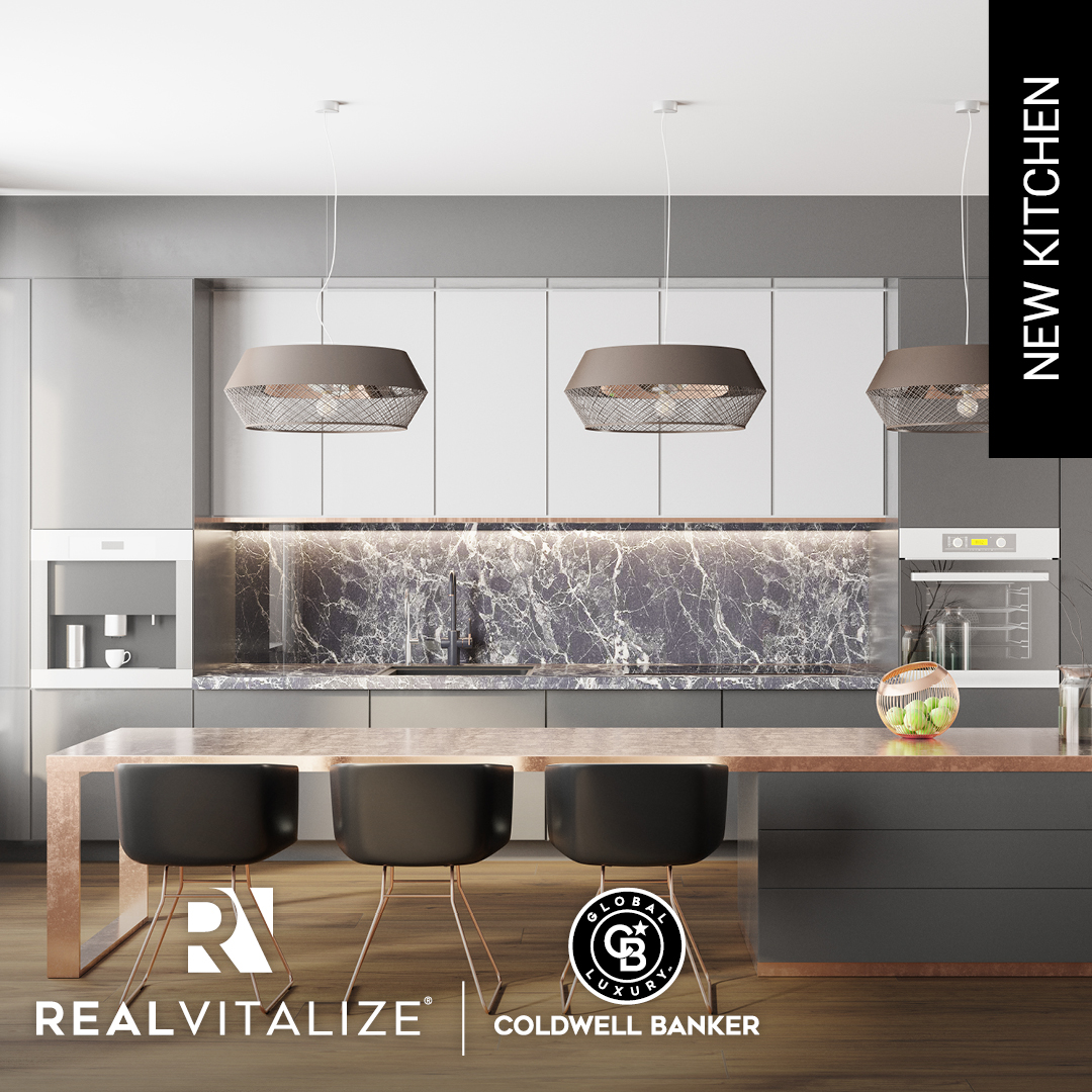 Renovated, beautiful kitchen with gray marble and white modern cabinets; showcasing a new kitchen renovation